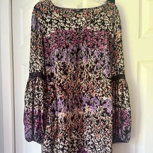 Floral dress, falls around knee length